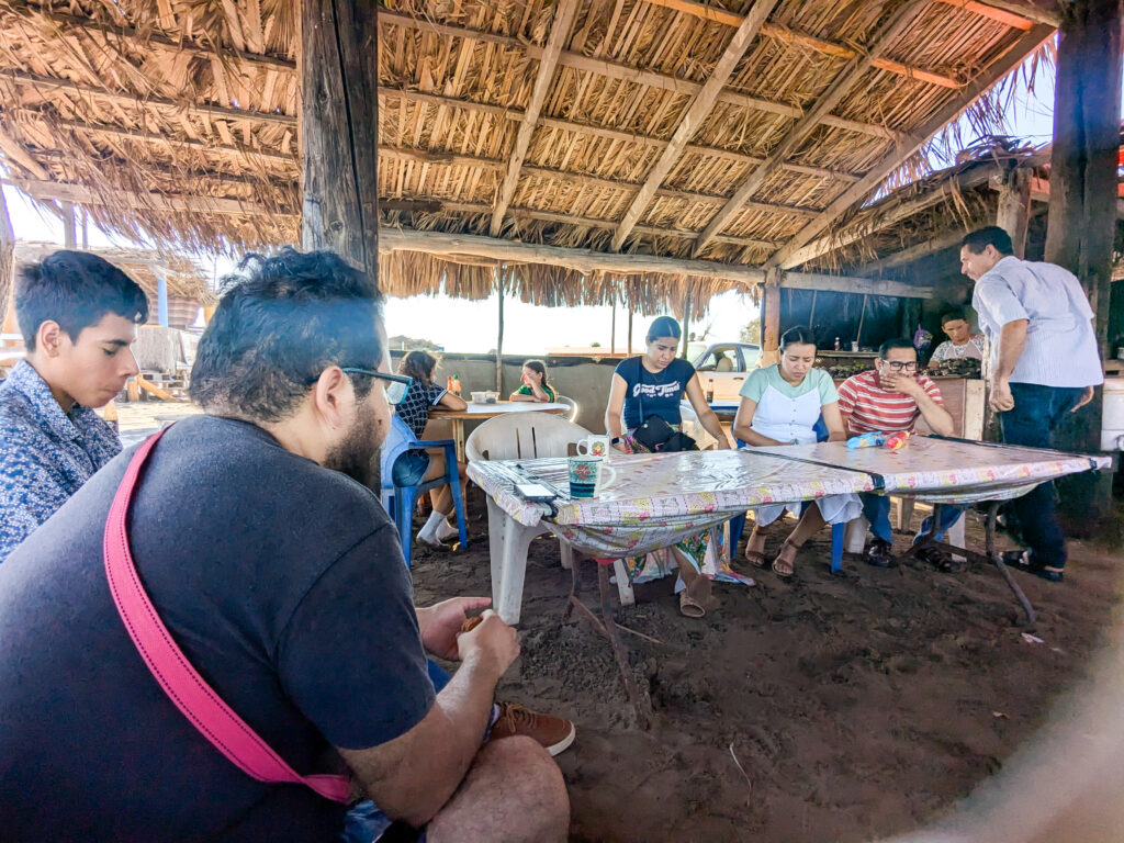 Pastor Efraín praying 